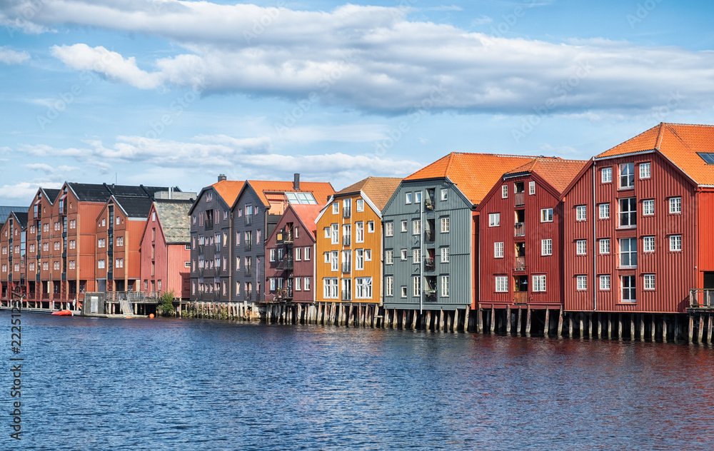 Old colourful wooden warehouses on the river Nidelva in the city of Trondheim, Norway.
