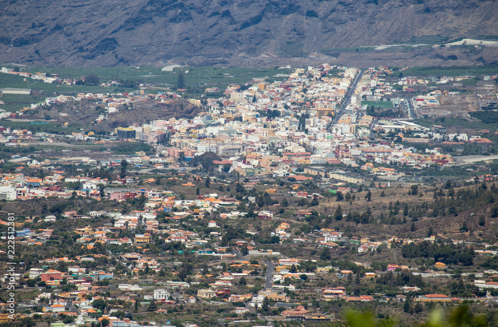 Panoramic view on the city Los Llanos in the valley. Banana plantations and mountains in the background.