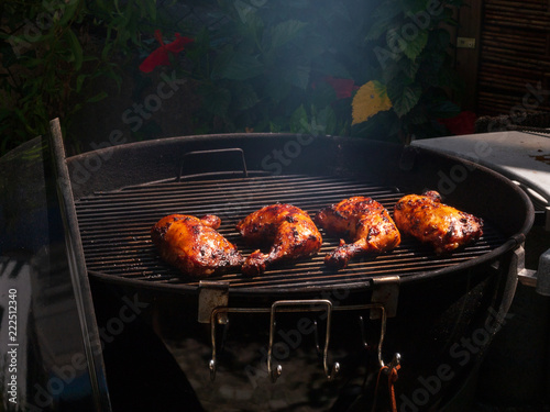 Happy Chicken on the grill with a warm environment