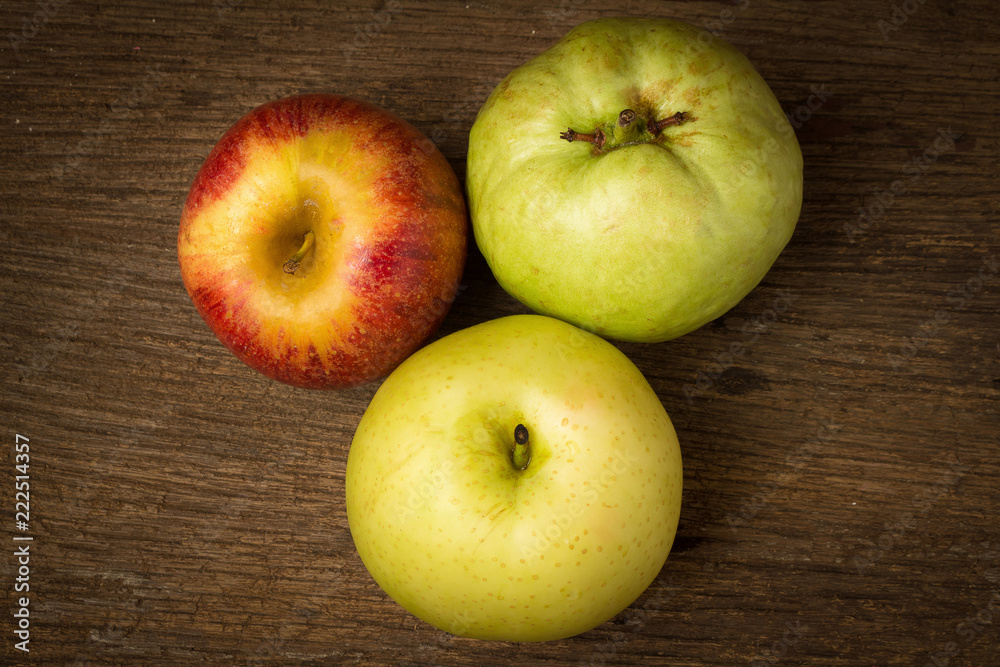 fruit traffic light concept. apple red. chinese pear yellow. guava green. on old wood fruit traffic light concept. apple red. chinese pear yellow. guava green. on old wood