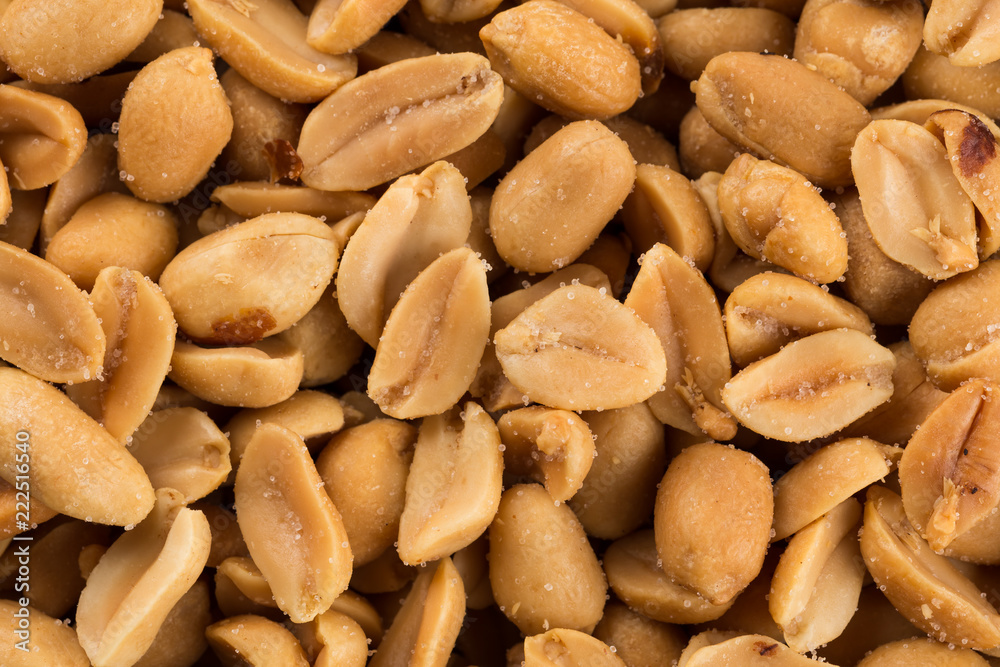 large amount of peeled salted peanuts large amount of peeled salted peanuts