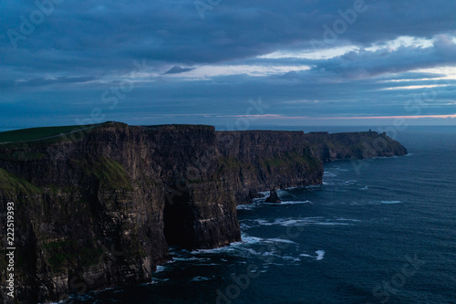 The cliffs of moher during blue hour. The photo is moody.