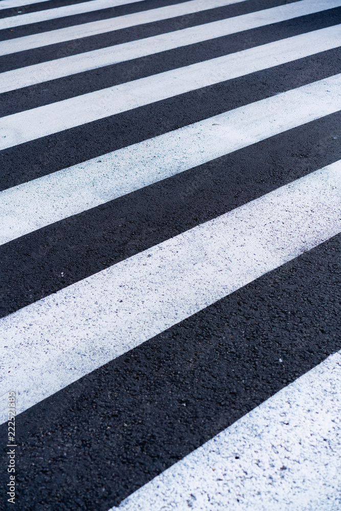White and black asphalt at a street crossing