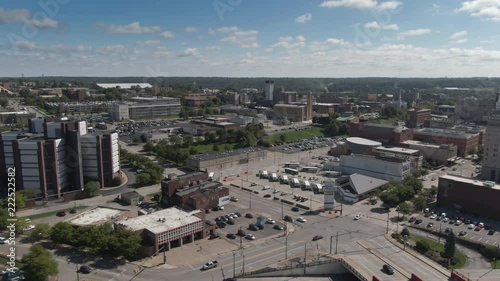 A day aerial reverse establishing shot of the skyline of Youngstown, Ohio on a late summer morning.  	 photo