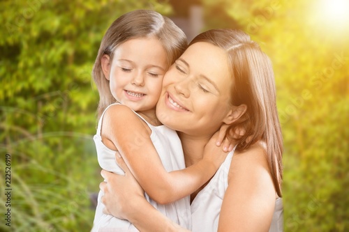 Happy Mother and daughter hugging