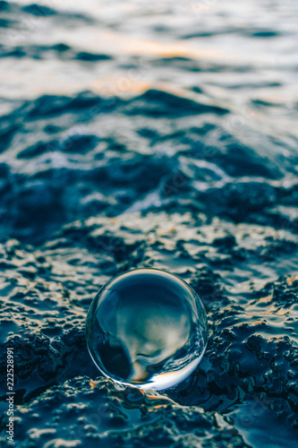 crystal ball in sea