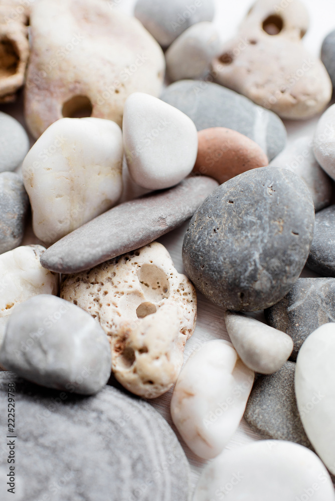 Art of multi-colored stones on a light background