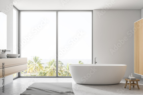 White bathroom interior, tub and sink