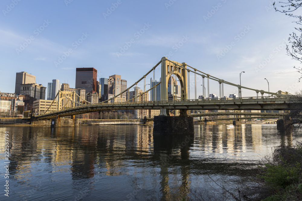 Urban waterfront and bridges crossing the Allegheny River in downtown Pittsburgh, Pennsylvania.