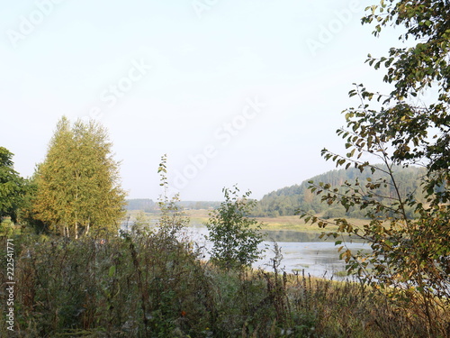 picturesque banks of the river in the autumn evening