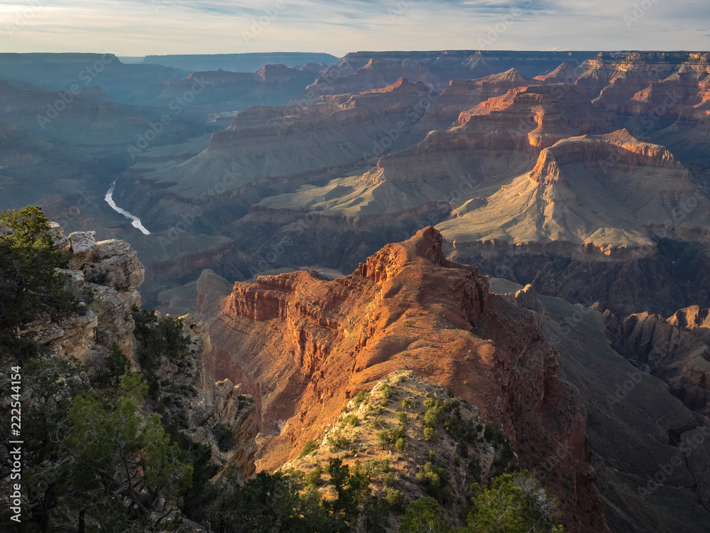 Peaks and ridges around Mohave Point in Arizona's Grand Canyon catch the sunset