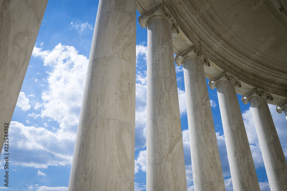 Abstract image of roman marble colonnade with sky background