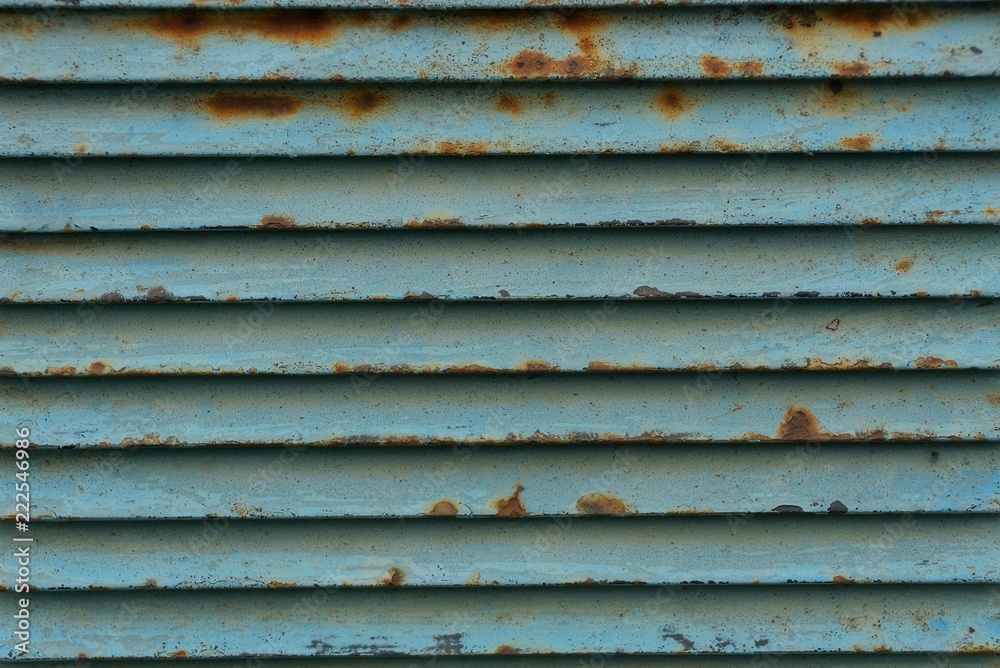 blue striped texture of metal from an old and rusty lattice blue striped texture of metal from an old and rusty lattice