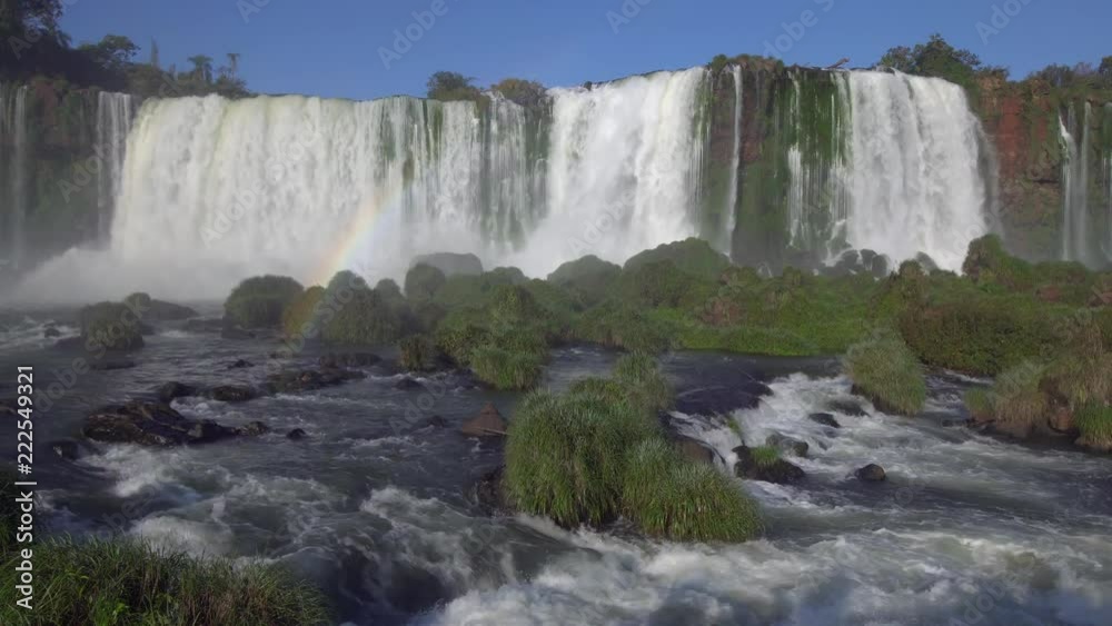Iguazu Falls in Argentina - Brasil Border is one of the Natural Seven Wonders of the World and an UNESCO World Heritage Site Iguazu Falls in Argentina - Brasil Border is one of the Natural Seven Wonders of the World and an UNESCO World Heritage Site