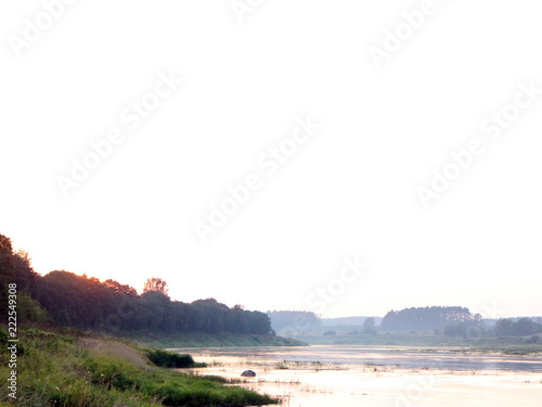 picturesque river bank at sunset