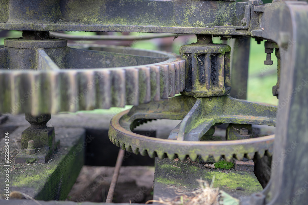 Old rusty gears. Gear wheels in agricultural equipment. Old rusty gears. Gear wheels in agricultural equipment.