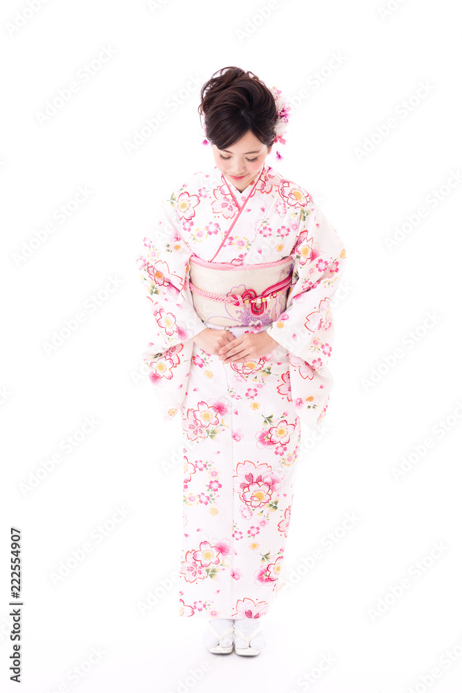 portrait of young asian woman wearing pink kimono on white background portrait of young asian woman wearing pink kimono on white background