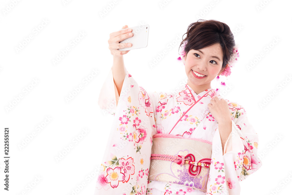 portrait of young asian woman wearing pink kimono on white background portrait of young asian woman wearing pink kimono on white background