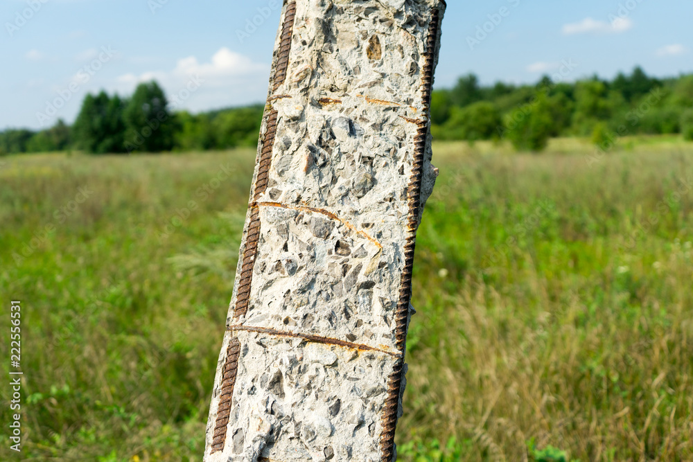 Old concrete pillar. The destruction of concrete over time. Old concrete pillar. The destruction of concrete over time.