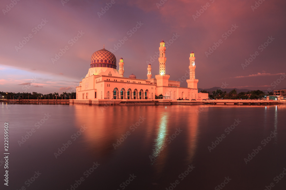 Kota Kinabalu Floating mosque with dramatics clouds during sunset , Beautiful sunset at Kota Kinabalu City Mosque Sabah Borneo, Malaysia
