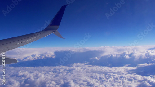 Airplane in the sky at plane sky clouds horizont