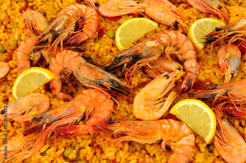 Fresh seafood paella with shell on prawns background Fresh seafood paella with shell on prawns background