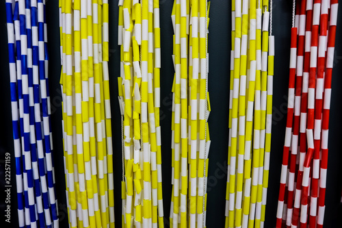 Canvas Print Bright colorful skipping ropes hanging against a blue background