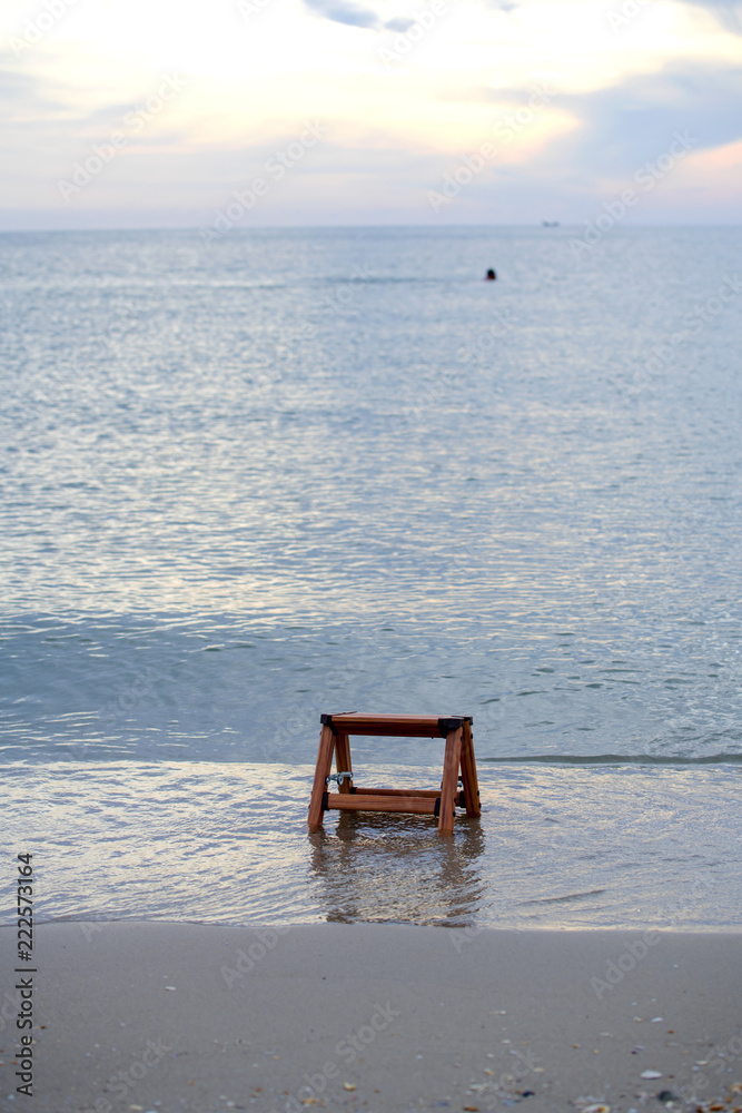 A ladder placed in the sea at dawn is a concept that would work effort no matter where they are in place A ladder placed in the sea at dawn is a concept that would work effort no matter where they are in place