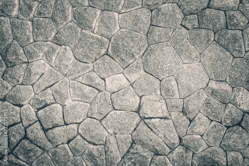 Old grunge stone wall retro vintage style background and texture.