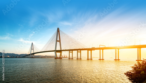 Landscape of the bridge over the sea at dusk
