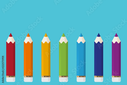 cartoon pensils  isolated on blue background photo