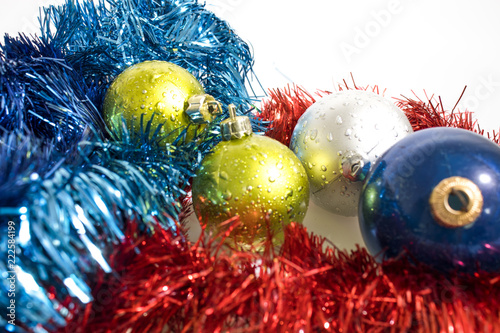 Christmas tree decorations, colorated balls isolated in a whte background photo