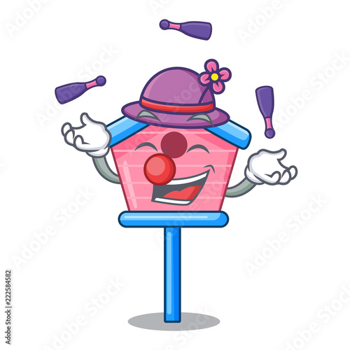Juggling bird house on a tree cartoon