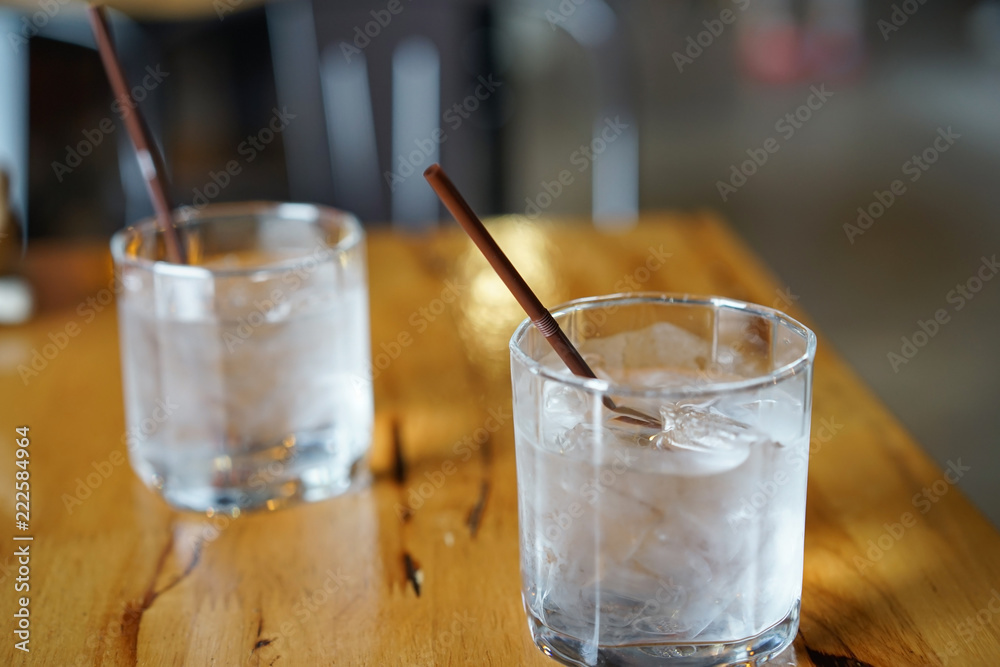 drinking water In the glass on the table drinking water In the glass on the table