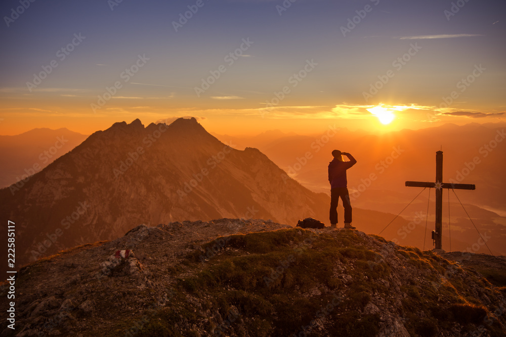 a Girl looks in the sunset in Austria