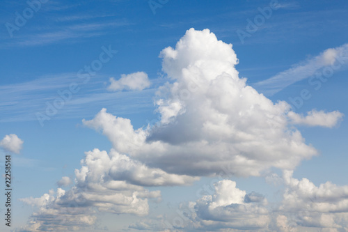 Cumulonimbus clouds in blue sky.