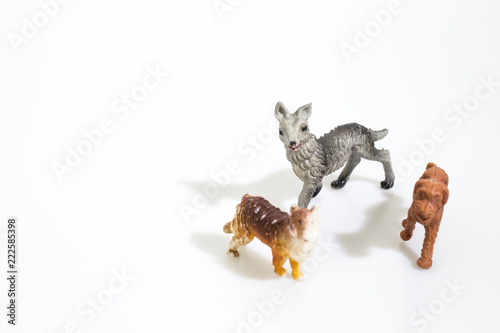 Christmas objects  plastic animals dogs for nativity diorama isolated in a white background