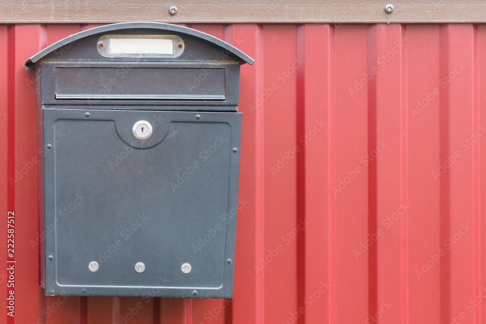 A beautiful mailbox hangs waiting for newspapers, parcels and letters. A beautiful mailbox hangs waiting for newspapers, parcels and letters.