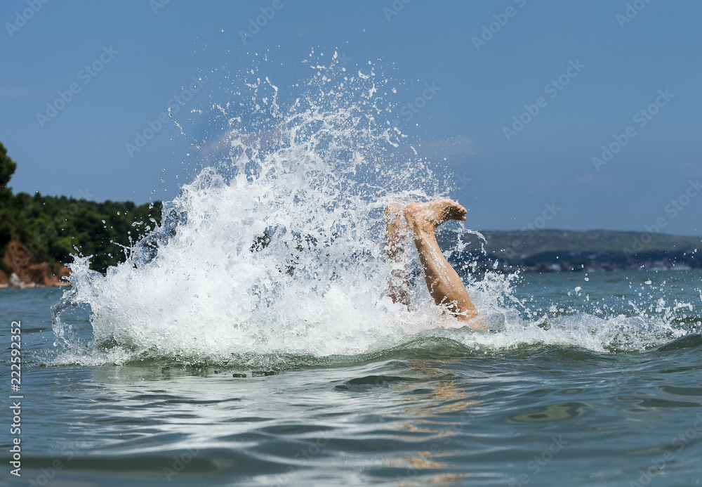 Man splashes with sea water