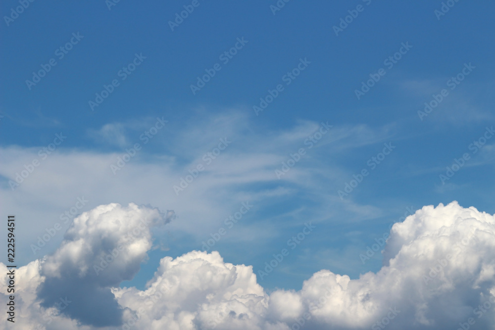 The summer cloud spreading in the blue sky The summer cloud spreading in the blue sky