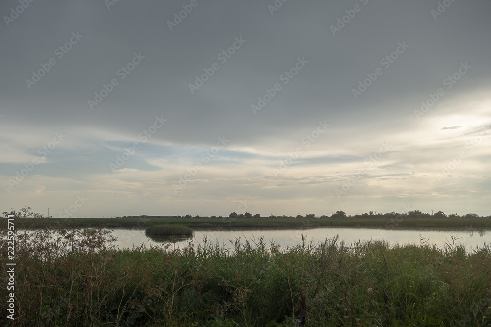 Landscape in Danube Delta, Romania, in a stormy weather day.