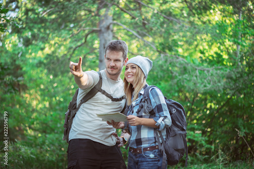 Hiking couple with map