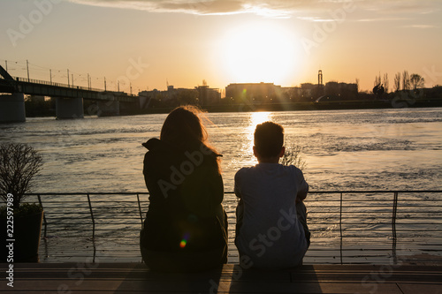 Sister and brother by the river 