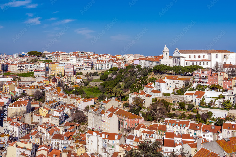 Lisbon, Portugal. The Mouraria and Graca Historical Districts with the Graca Church seen from the Castelo de Sao Jorge aka Saint George Castle.