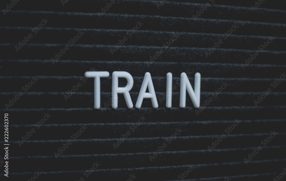 Word train written on the letter board. White letters on the black background. Business concept Word train written on the letter board. White letters on the black background. Business concept