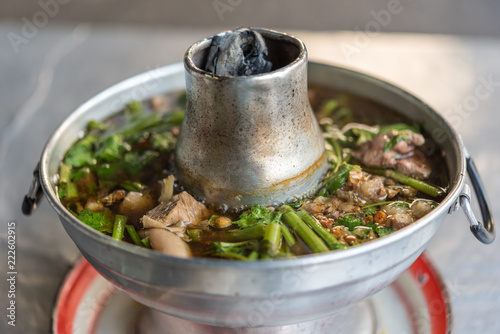 Braised beef clear with meat tendon soup stew photo