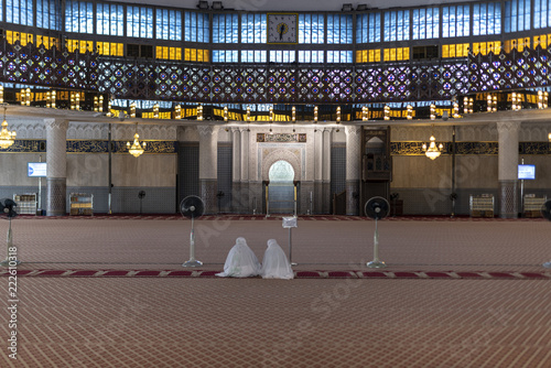 Photography Praying women in Mosque Masjid Jamek, Kuala Lumpur