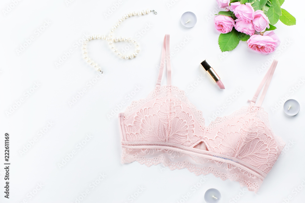 Woman elegant pink lace bra and panties, pumps and jewelry. Stylish lingerie flat lay. Woman elegant pink lace bra and panties, pumps and jewelry. Stylish lingerie flat lay.