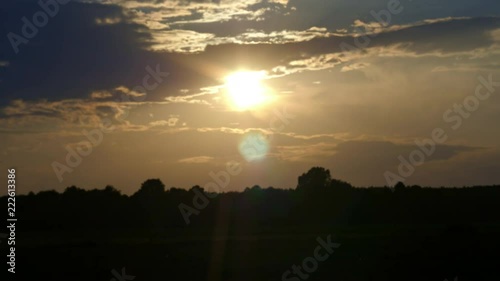 The clouds are flying in front of the sun