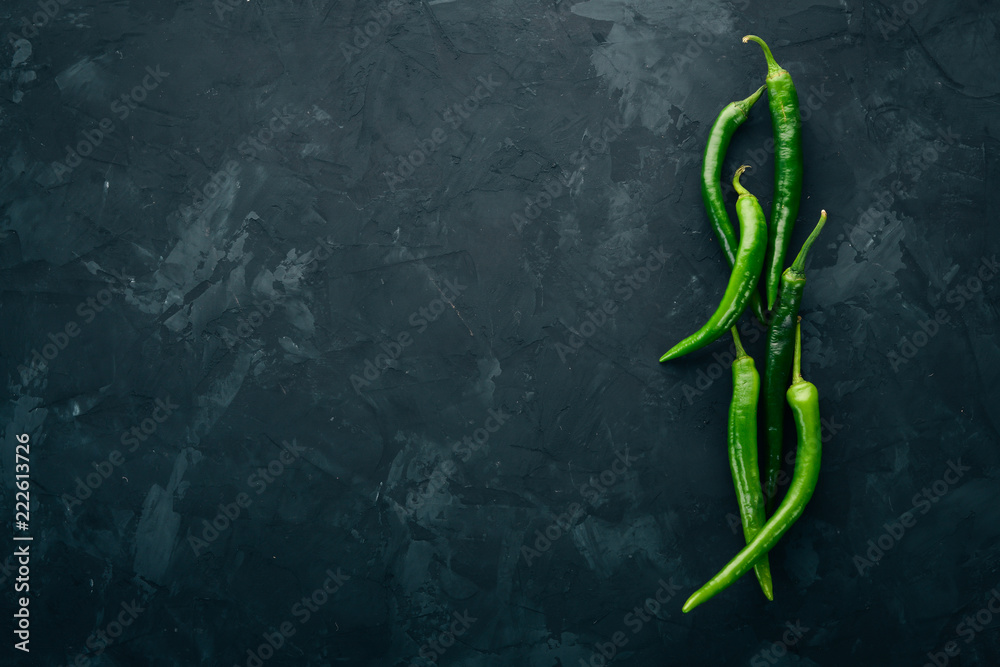 Fresh green chilli. On a black background. Top view. Free space for text.  Stock Photo | Adobe Stock